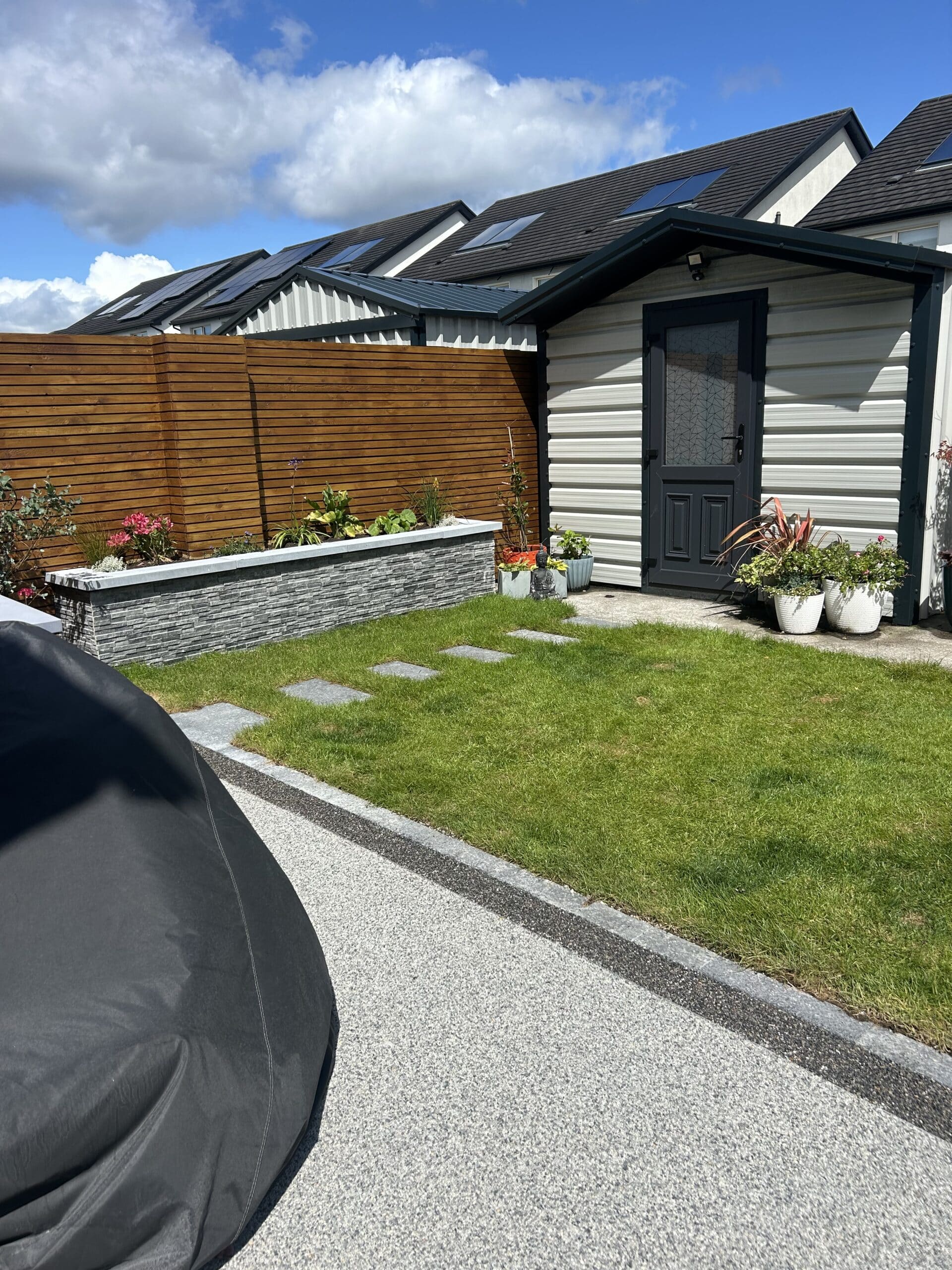 Bespoke garden design with resin bound in Galway city with cladded walls